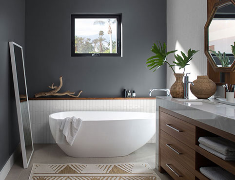 Bathroom walls painted in a matte gray charcoal slate paint color.