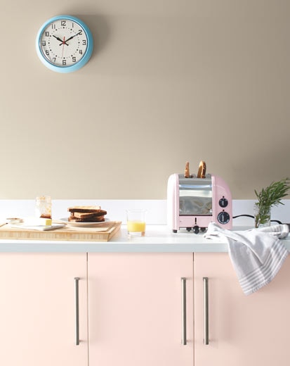 A pale kitchen with pink cabinets painted with Benjamin Moore's 2020 Color of the Year