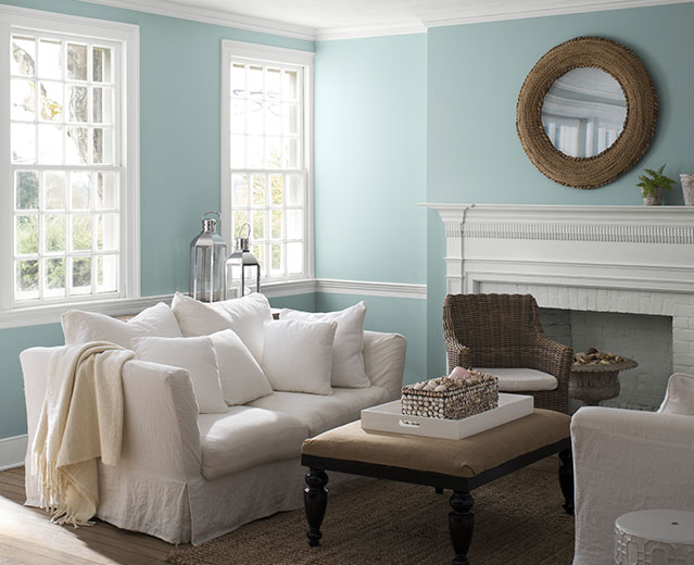 A living room painted in Gossamer Blue 2123-40 to show the impact of cool paint colors.