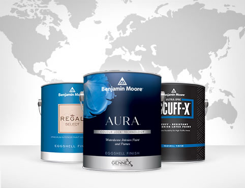 Cans of Benjamin Moore paint are presented in front of a global map.