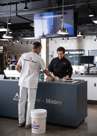 A painting contractor purchases paint from a local Benjamin Moore independent retailer. A painting contractor purchases paint from a local Benjamin Moore independent retailer.