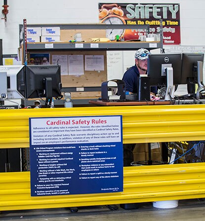 A Benjamin Moore employee at work in a distribution center. A Benjamin Moore employee at work in a distribution center.