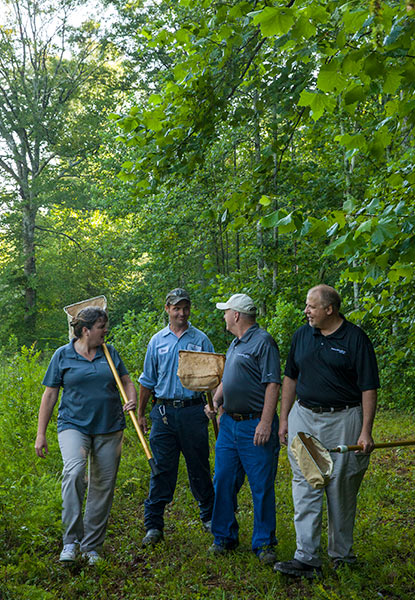 Benjamin Moore employees walk outside on our premises. Benjamin Moore employees walk outside on our premises.