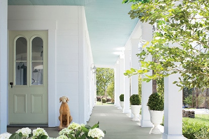 Front porch with a light blue ceiling painted in Harbour Haze 2136-60.