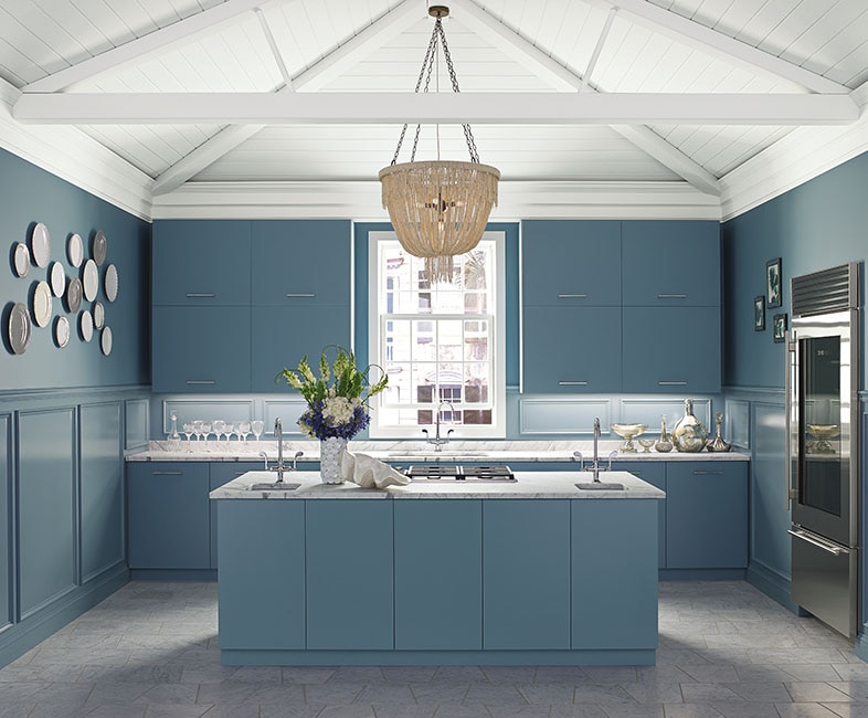 Blue kitchen with slate floors, Kohler hardware and granite countertops