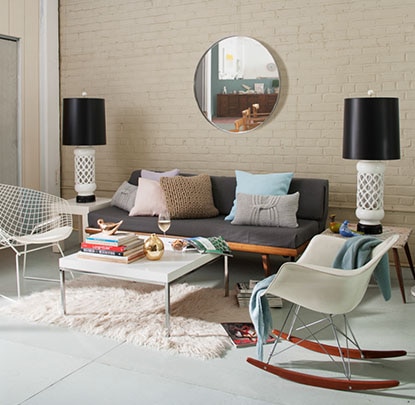 Living room with brick wall and modern furniture