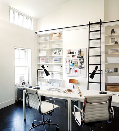 Bright home office painted in white paint