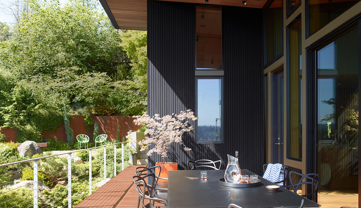 Exterior of a home in Black 2132-10 ARBORCOAT® Exterior Stain, Semi Solid and Leather Saddle Brown 2100-20, ARBORCOAT® Exterior Stain, Semi Transparent