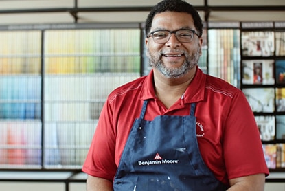 A male owner in his independently owned Benjamin Moore Store.