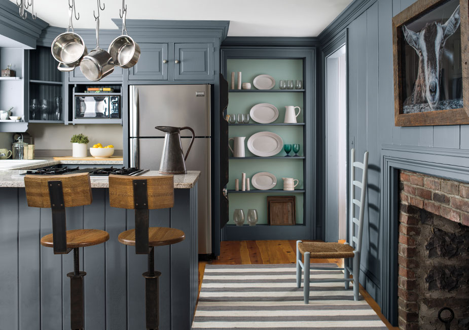 A farmhouse kitchen using a blue, blue-green & green color scheme creates an elegant look.