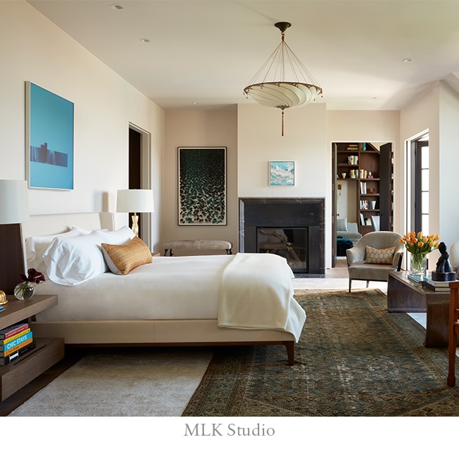 Large bedroom with neutral off-white walls.