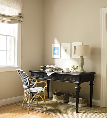 A corner study area with walls painted in Shaker Beige HC-45 and ceilings painted in Simply White OC-117.
