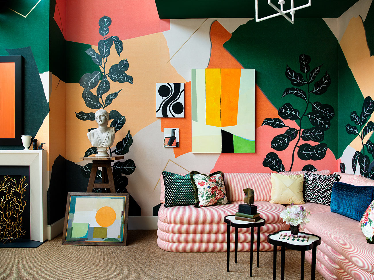 Young Huh's Kips Bay Decorator Show House 2019: Sitting room with pink couch and multi-colored abstract walls painted in a range of Benjamin Moore colors. Young Huh's Kips Bay Decorator Show House 2019: Sitting room with pink couch and multi-colored abstract walls painted in a range of Benjamin Moore colors.