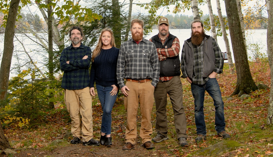 The 5-person cast of Maine Cabin Masters, who also own the Kennebec Cabin Company, pose in the woods. The 5-person cast of Maine Cabin Masters, who also own the Kennebec Cabin Company, pose in the woods.