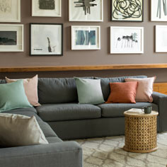 A living room in neutral paint colors sets a relaxing, warm tone.