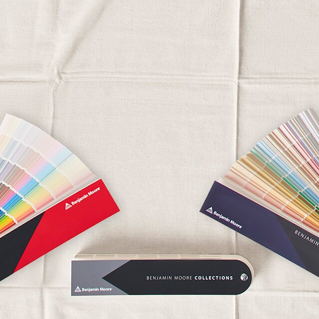 Three paint fan decks are displayed: Benjamin Moore Classics®, Collections, and Benjamin Moore Color Preview®.