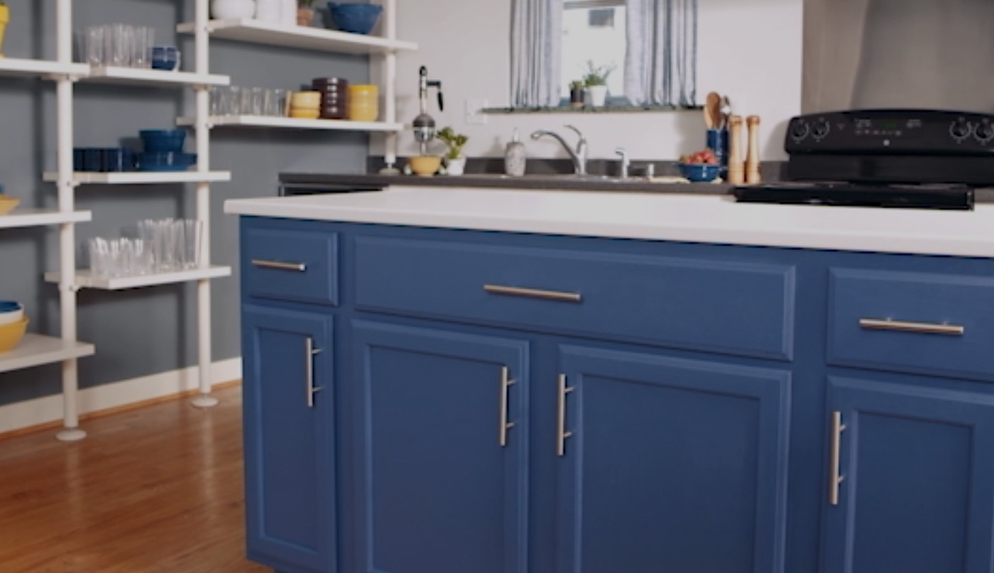 Cool blue kitchen colour scheme with blue kitchen cabinets.