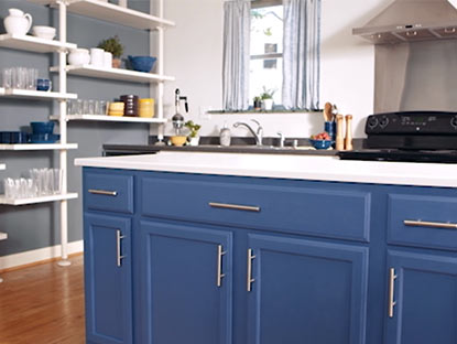 Cool blue kitchen colour scheme with blue kitchen cabinets.