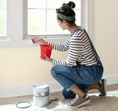 Homeowner properly priming window trim using Fresh Start.