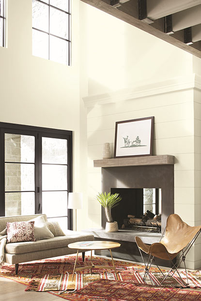 Living room walls in off-white paint in satin finish.