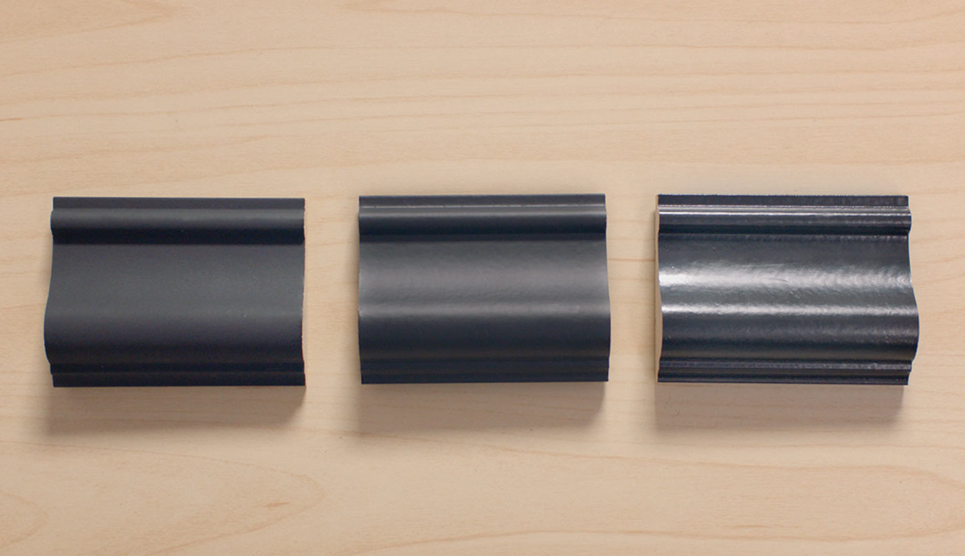 Black trim samples with different finishes.