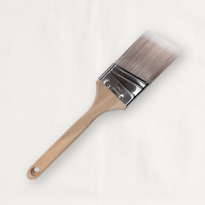 An angled sash brush with a wood handle.