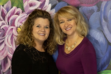 Two female owners and operators of Decorative and Faux Finishes.