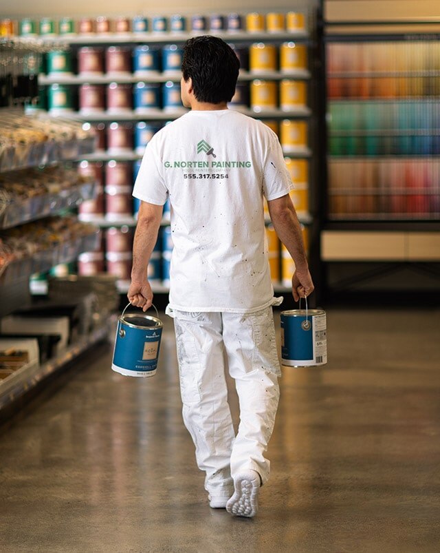 A painting contractor purchasing Benjamin Moore paint.