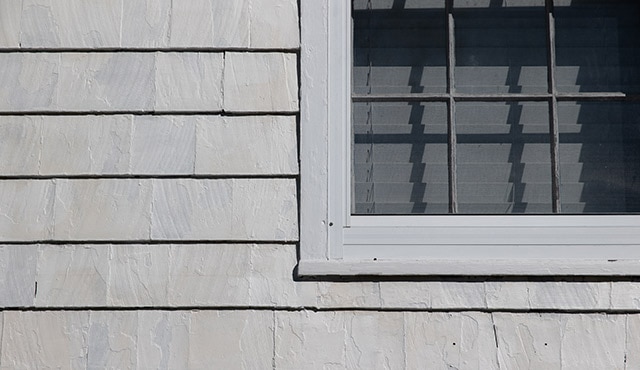 Siding of a home that has used INSL-X Peel Bonding Primer.