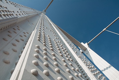 A urethane-coated bridge beam is protected from the harshest weather conditions, while still maintaining its fresh white color.