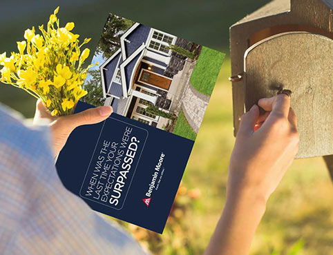 An advertisement for Benjamin Moore Contractor Marketing Solutions appears in a mailbox. An advertisement for Benjamin Moore Contractor Marketing Solutions appears in a mailbox.