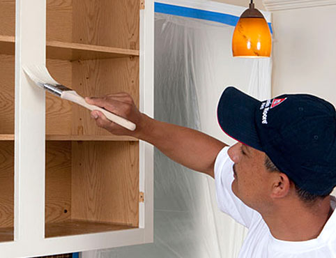 Benjamin Moore contractor refinishing kitchen cabinets.